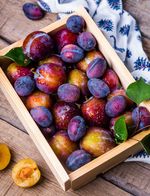 Plums in a crate